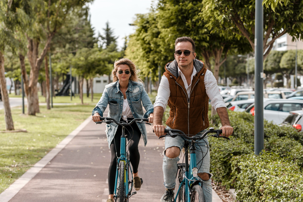 Man and woman riding their bikes